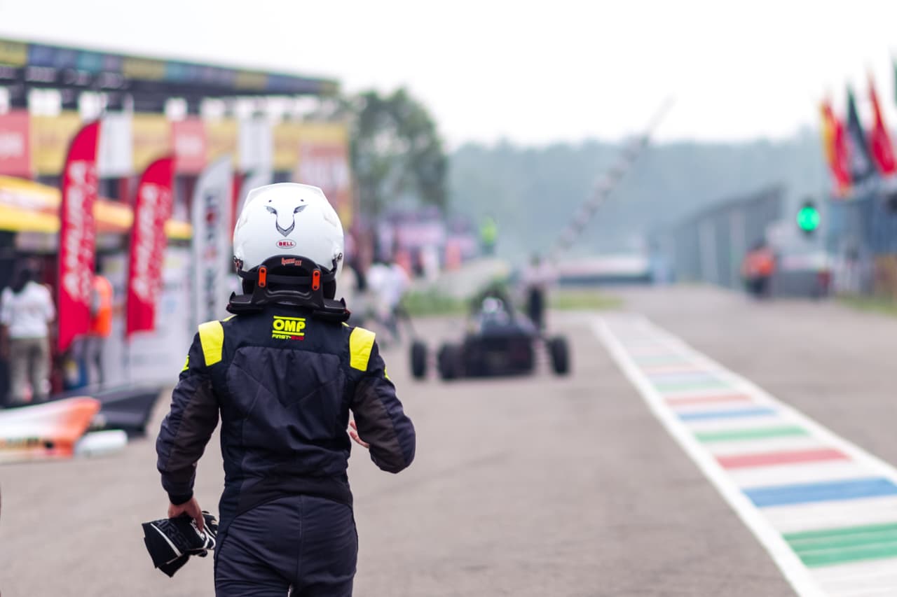 Avi Malavalli walking down the pit lane